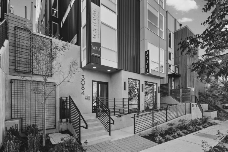 Avala Apartments building front in black and white